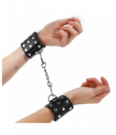 KINK - WRIST RESTRAINTS WITH SNAP FASTEN FULL OF RIVETS BLACK ADJUSTABLE 19-24 CM X 5.5 CM